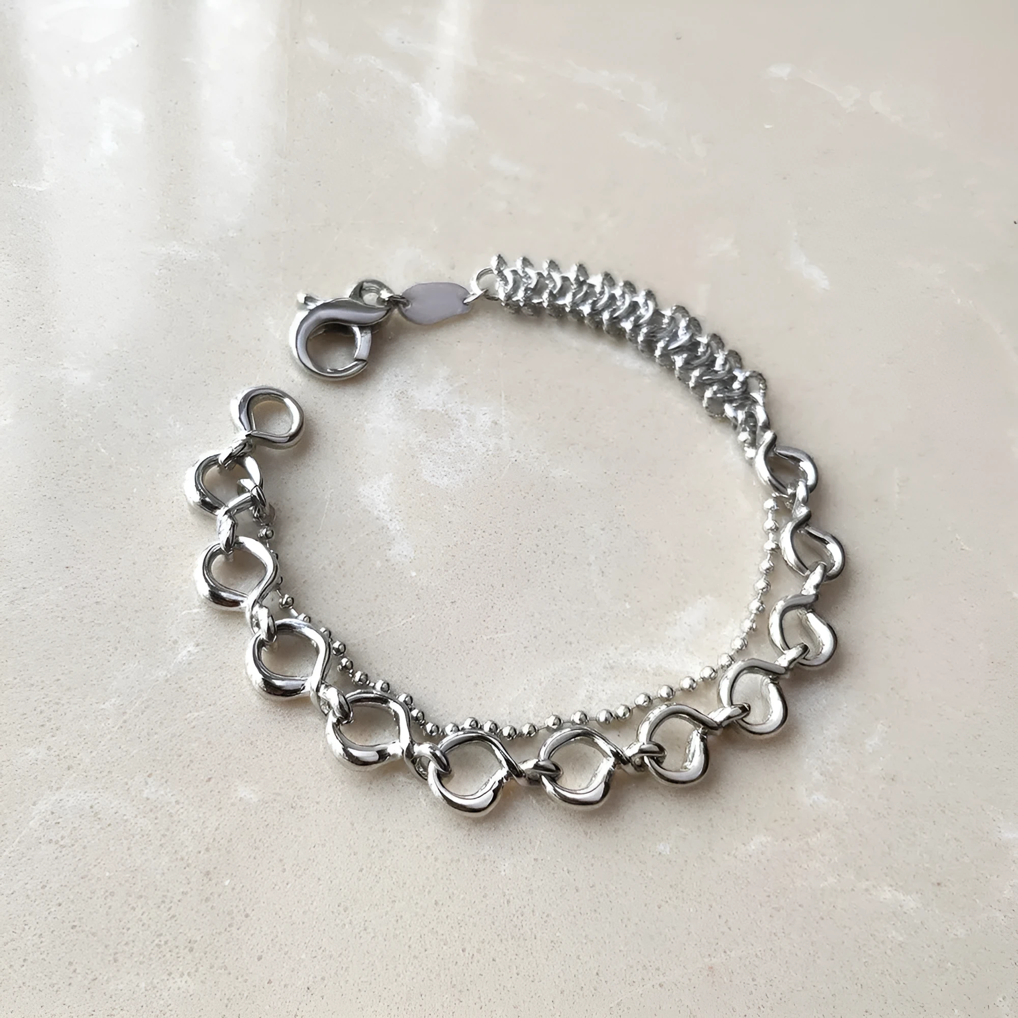 Metal wind venom splicing bracelet in silver, simple unisex design with copper and platinum plating