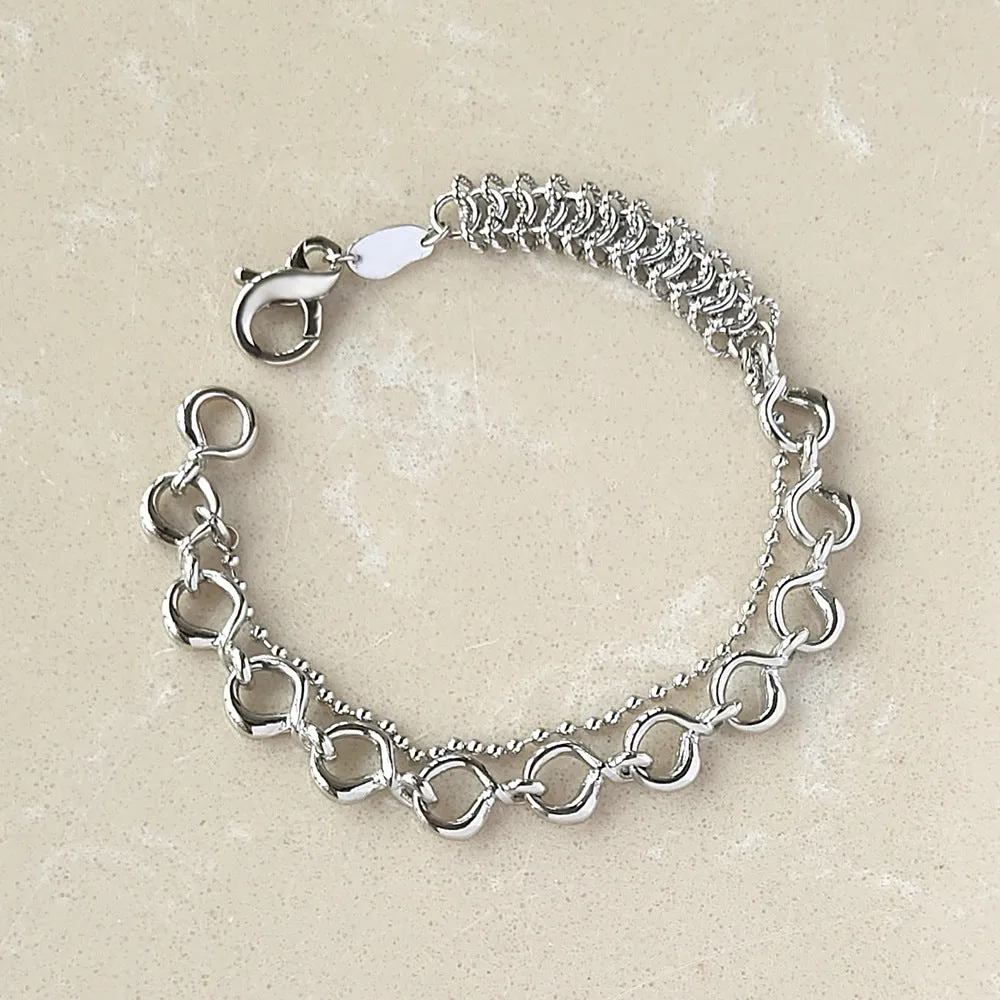 Metal wind venom splicing bracelet in silver, simple unisex design with copper and platinum plating