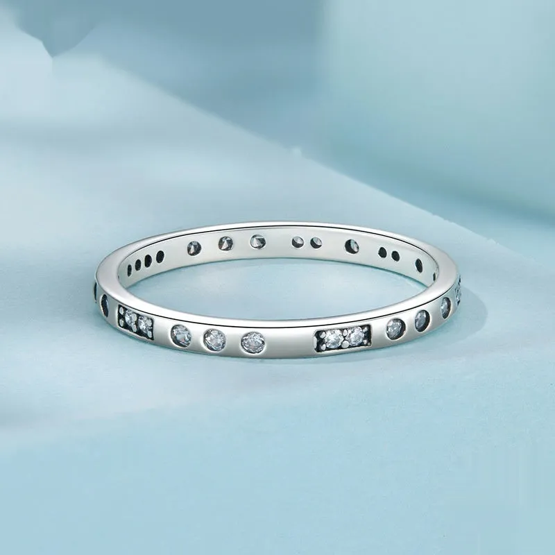 Moss Password I Love You silver-toned ring with oxidised black finish on a hand
