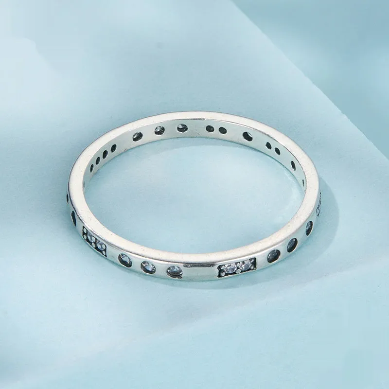 Moss Password I Love You silver-toned ring with oxidised black finish on a hand