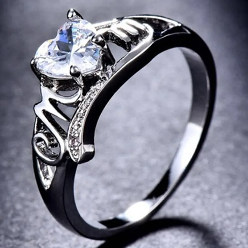 Heart shaped opal mother ring with alloy setting and artificial gemstone details in blue