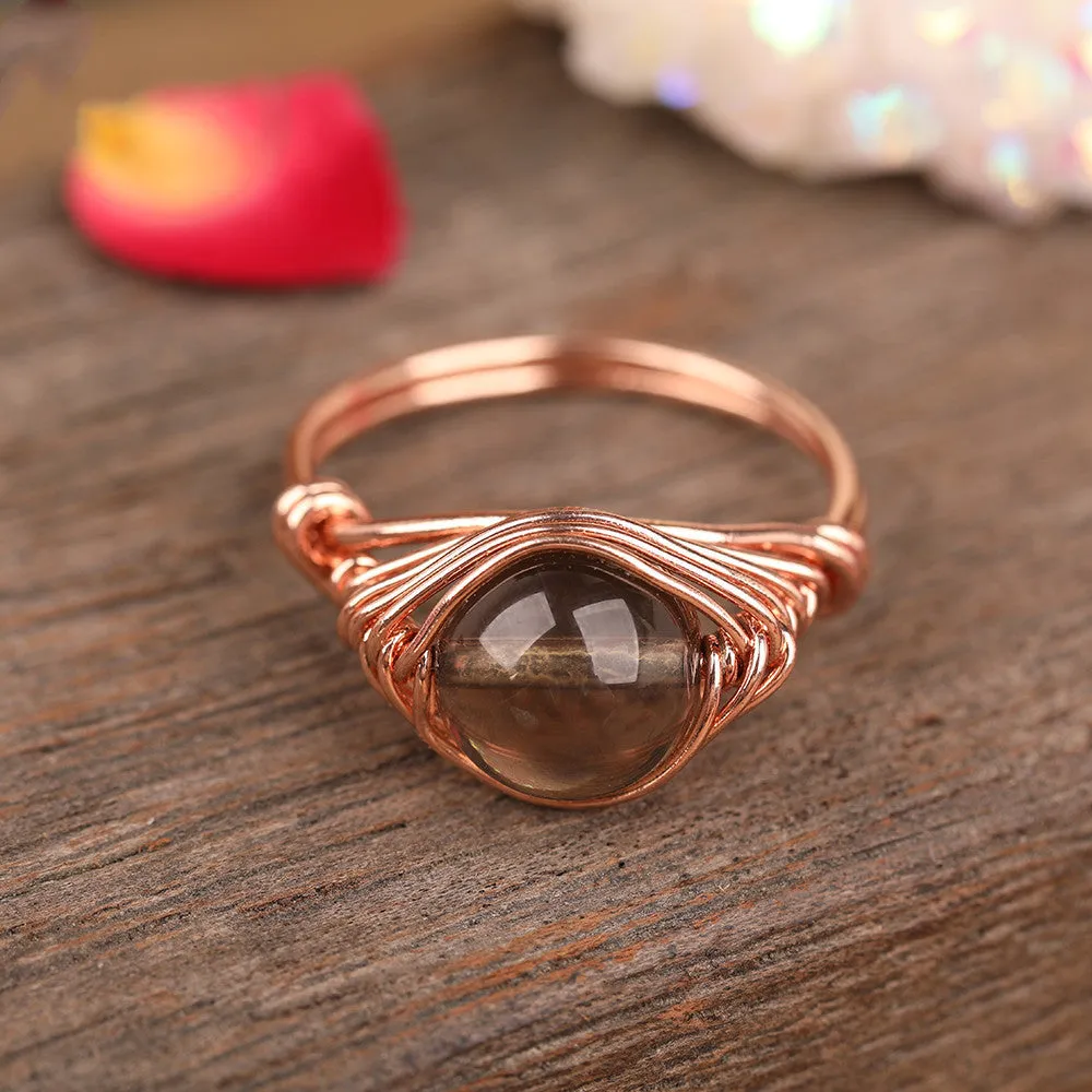 Handmade natural stone ring with adjustable copper band on finger, Amethyst Quartz option.