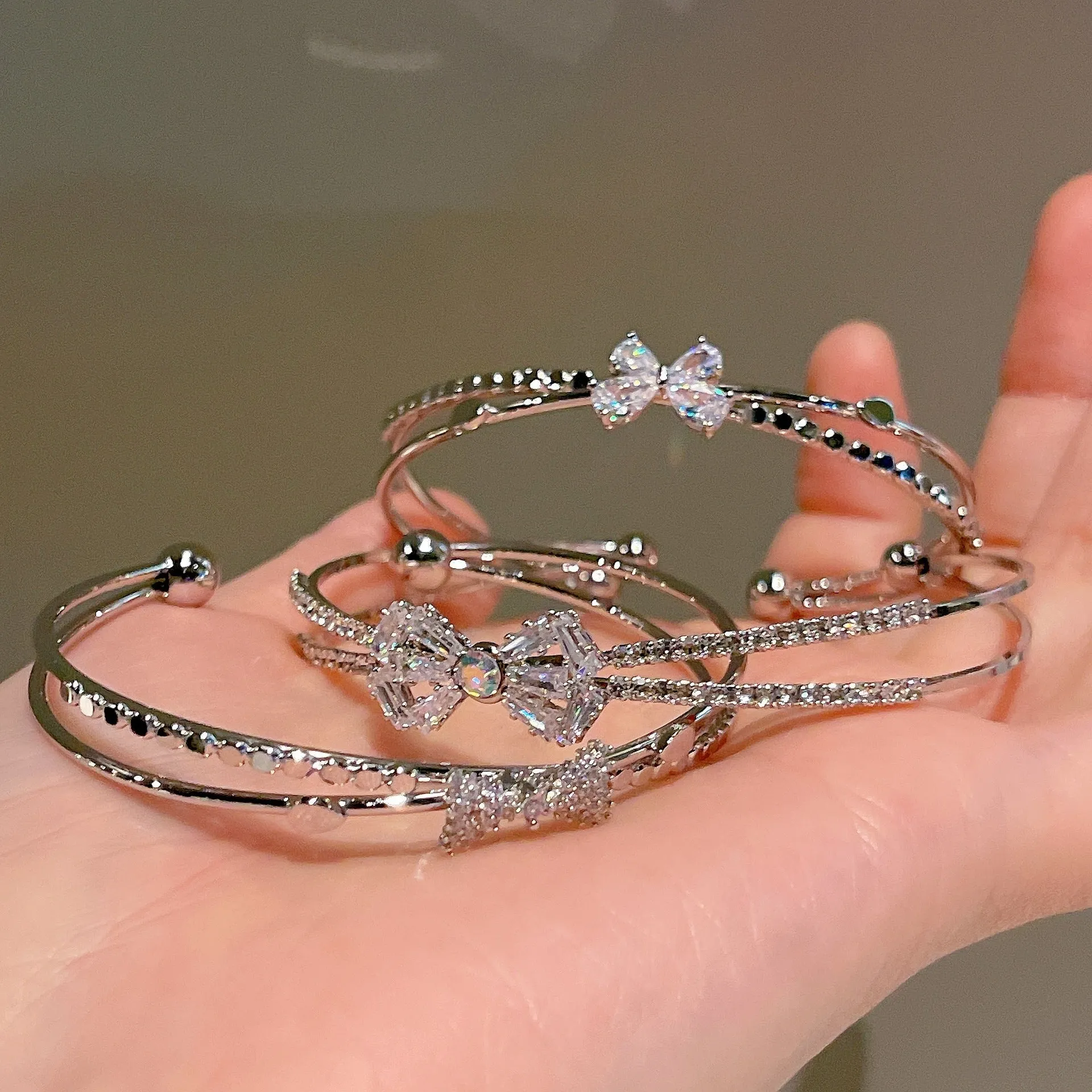 Women's silver electroplated copper bow bracelet with zircon stones minimal style