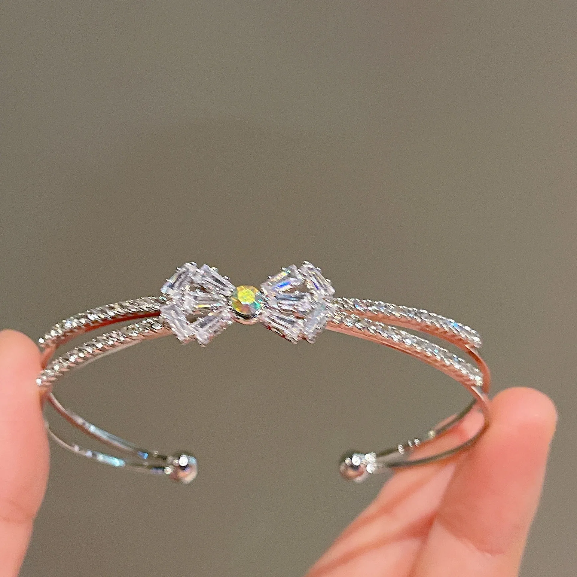 Women's silver electroplated copper bow bracelet with zircon stones minimal style