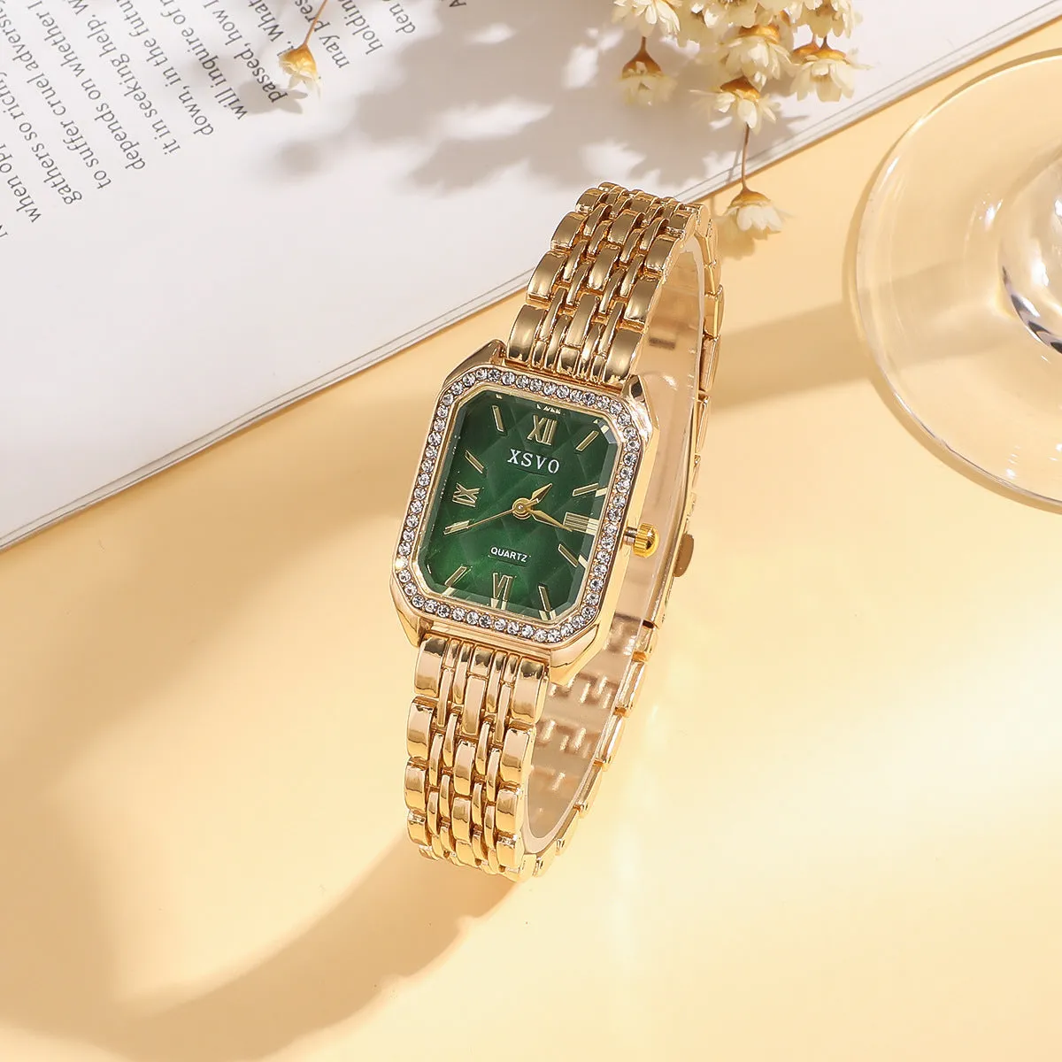 Gold green women's square watch with four matching bracelets showing 25mm dial and alloy construction