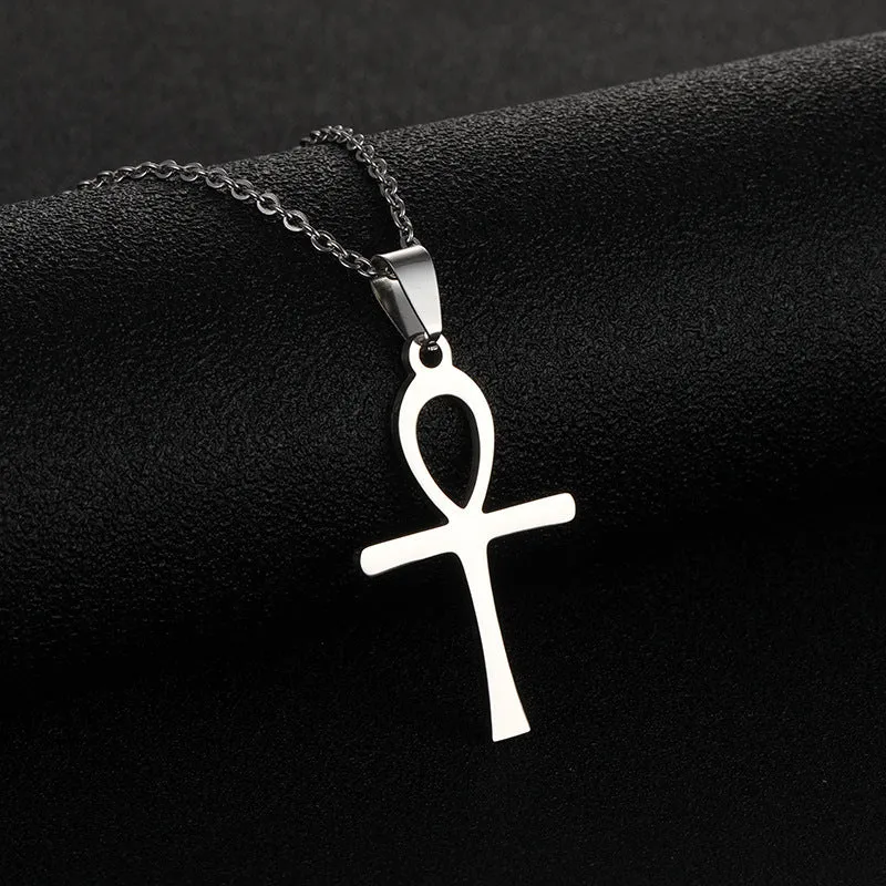 Stainless steel cross necklace on display showing O-shaped chain and pendant in steel colour finish