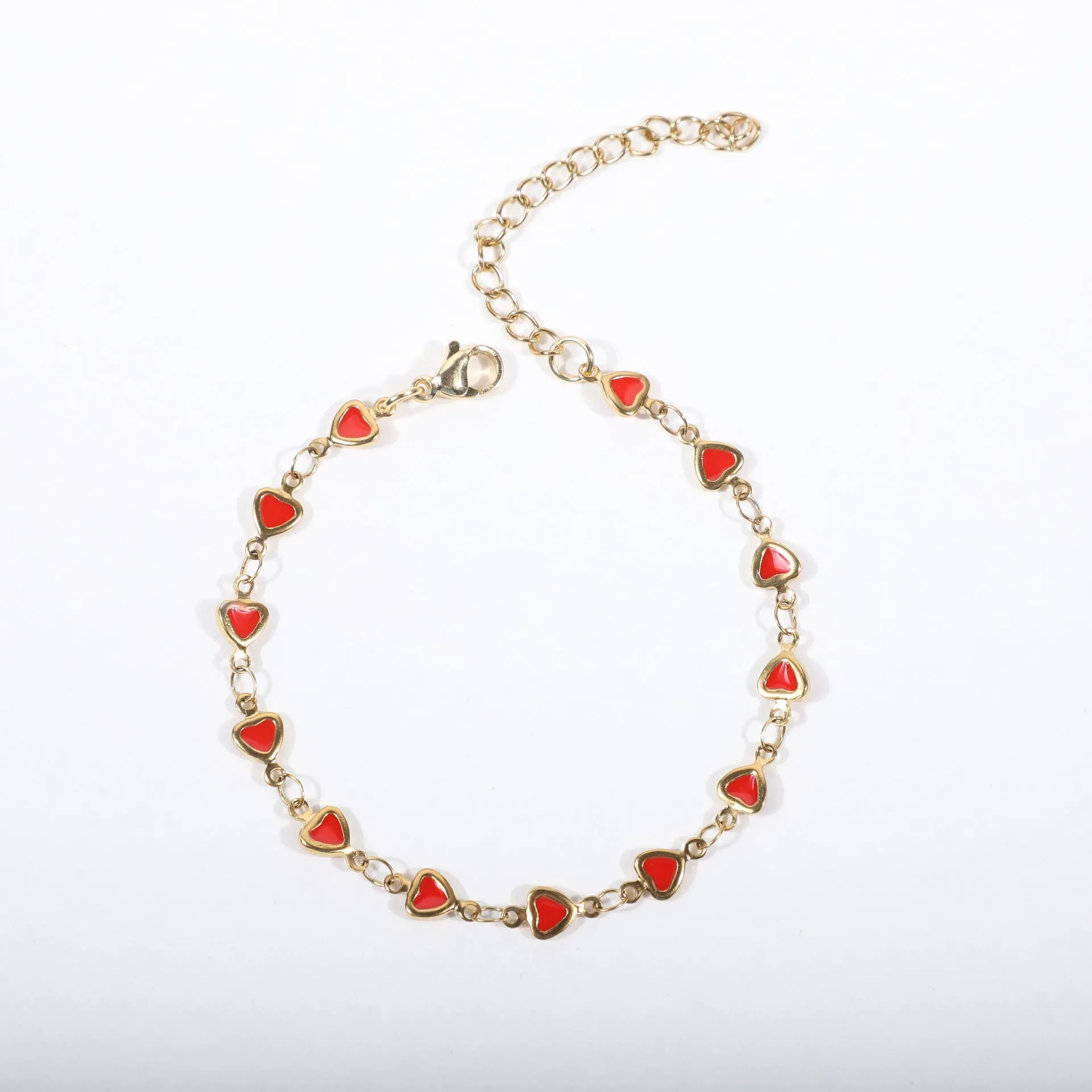 Stainless steel bracelet with heart design and 18K gold plating in various colour options