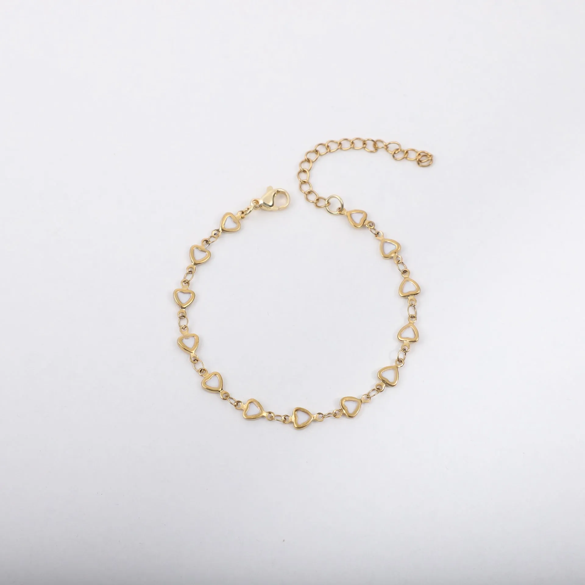 Stainless steel bracelet with heart design and 18K gold plating in various colour options