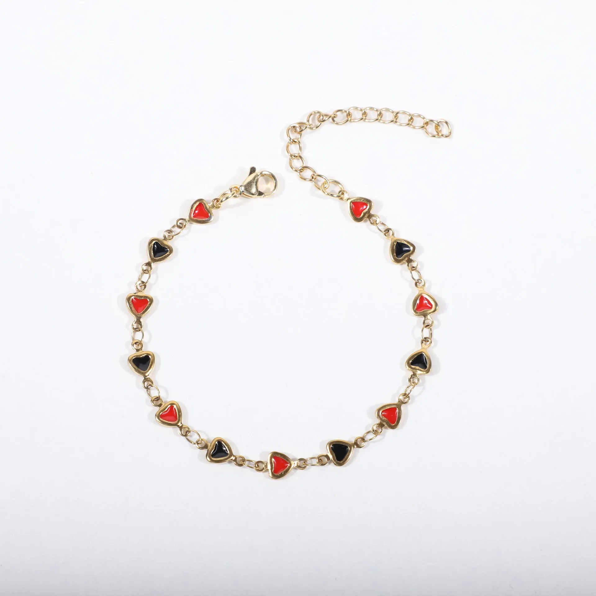 Stainless steel bracelet with heart design and 18K gold plating in various colour options