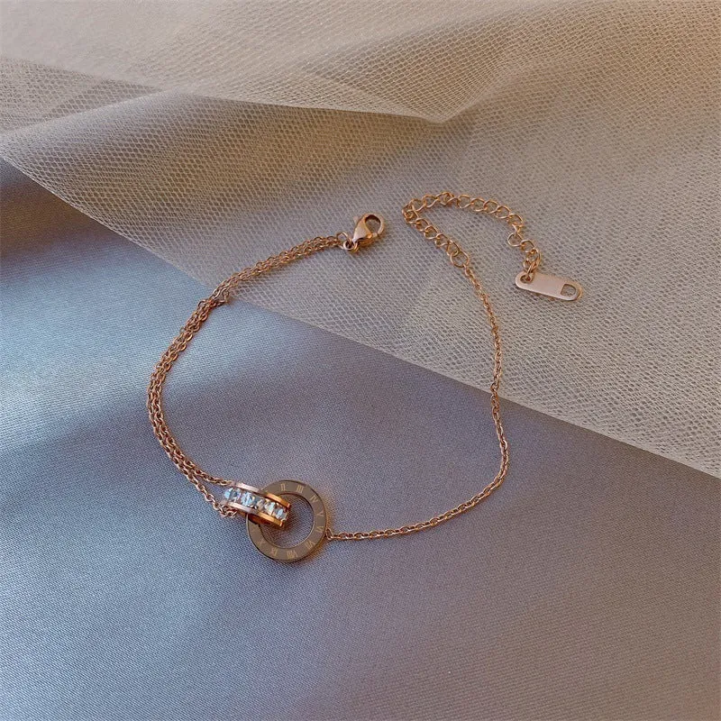 Women's zircon flower bracelet in titanium steel with gold adjustable waist and geometric design