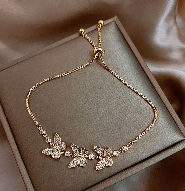 Women's zircon flower bracelet in titanium steel with gold adjustable waist and geometric design