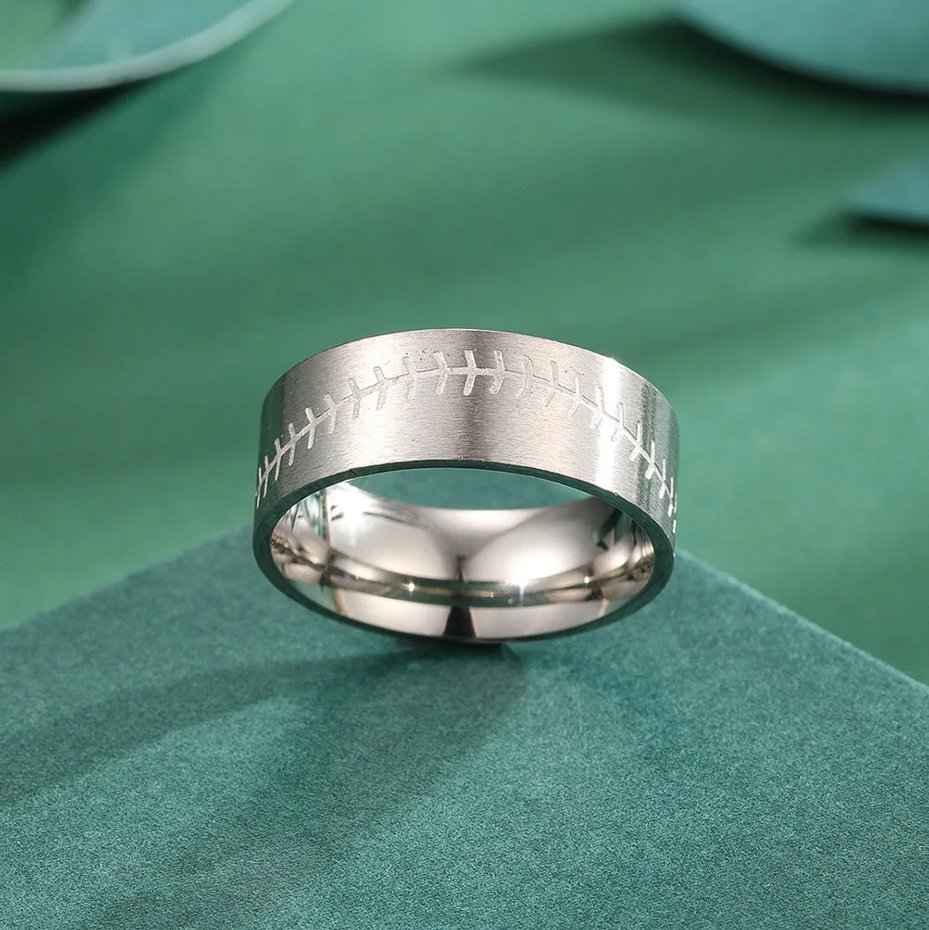 Stainless steel dopamine ring in gold finish with geometric pattern on a white background