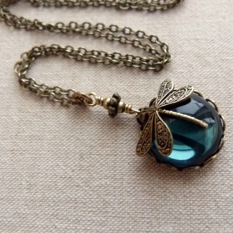 Vintage bronze dragonfly pendant necklace in 925 sterling silver on a chain, yellow colour finish.