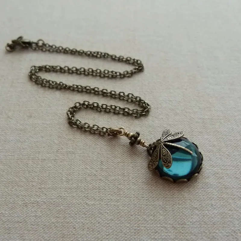Vintage bronze dragonfly pendant necklace in 925 sterling silver on a chain, yellow colour finish.