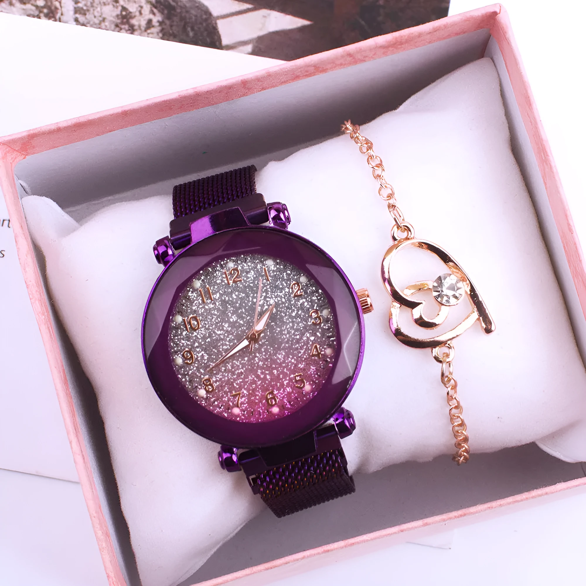 Silver Noodle ladies quartz watch with round dial, alloy strap, magnet buckle, and matching chain in gift box