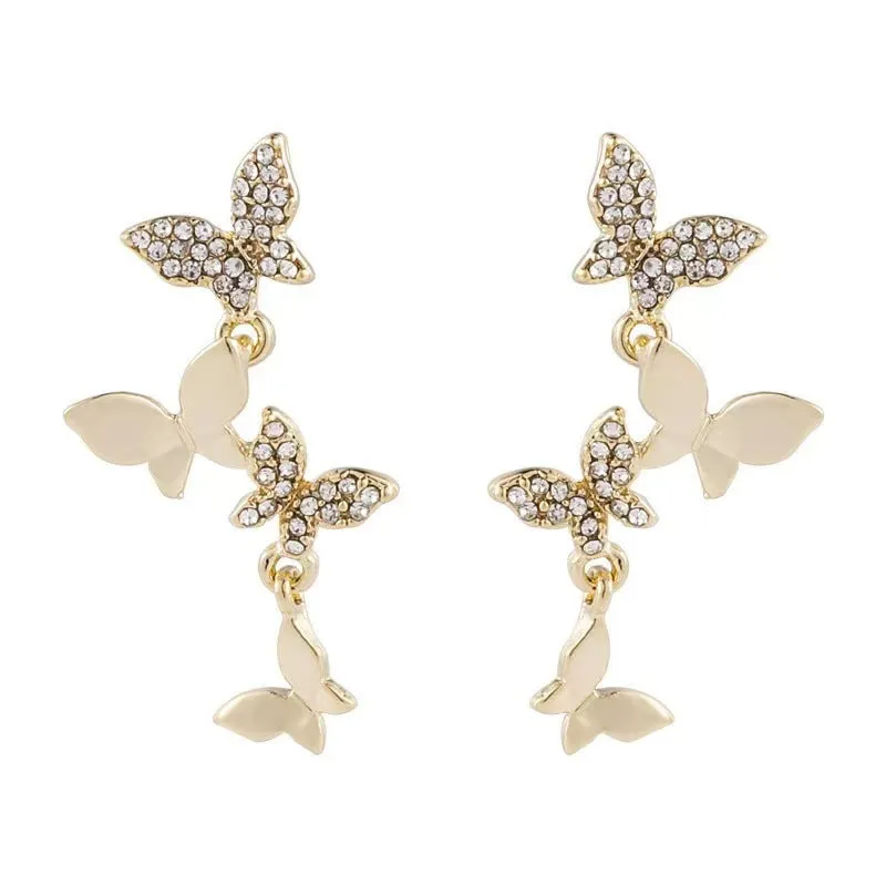 Women's gold-coloured copper butterfly earrings with four butterfly drop design