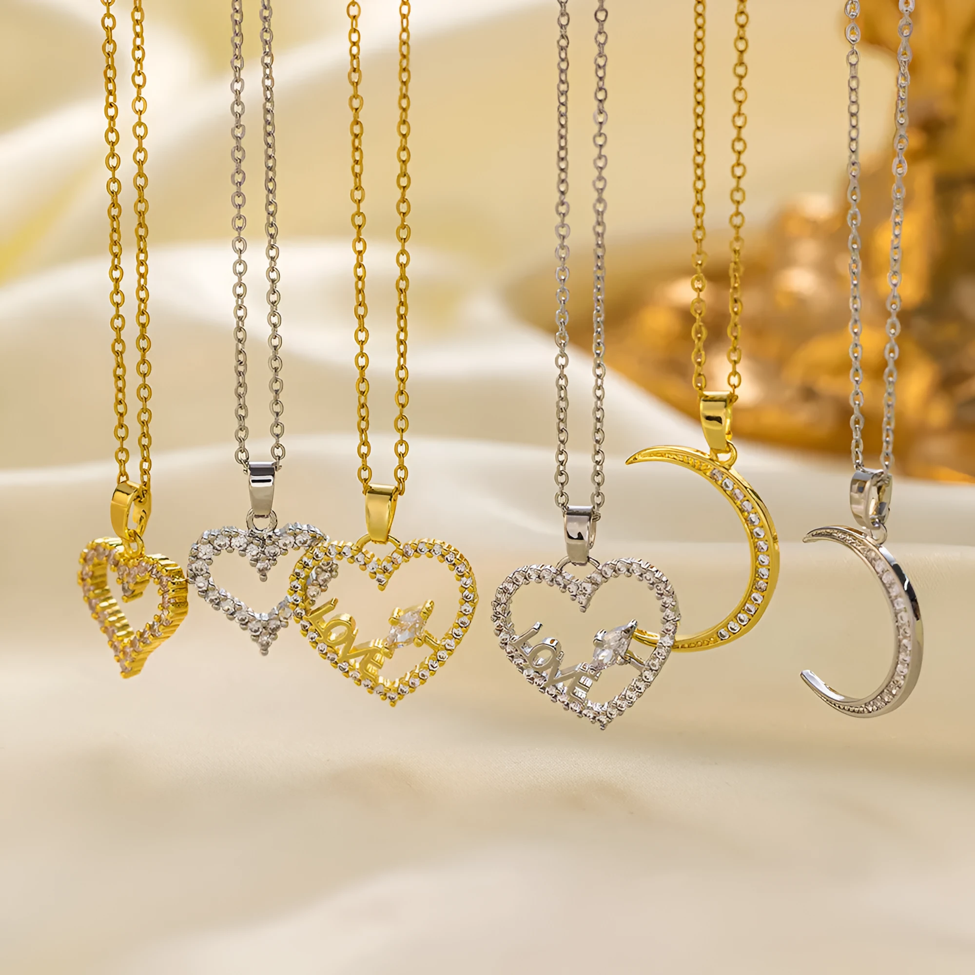 Women's titanium steel and copper-plated pendant necklace set crescent heart shapes gold and steel finish
