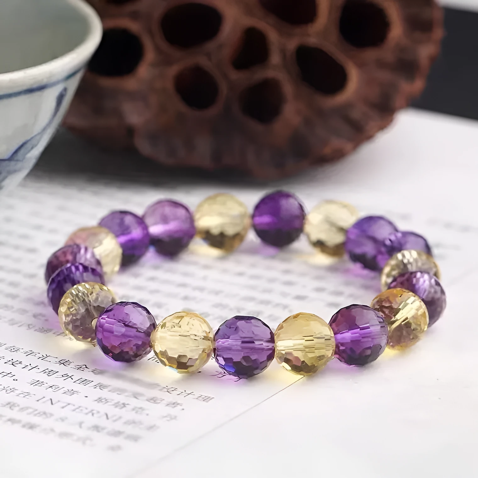Handmade unisex bracelet with 128-faceted crystal beads and a decorative charm, available in multiple bead sizes.