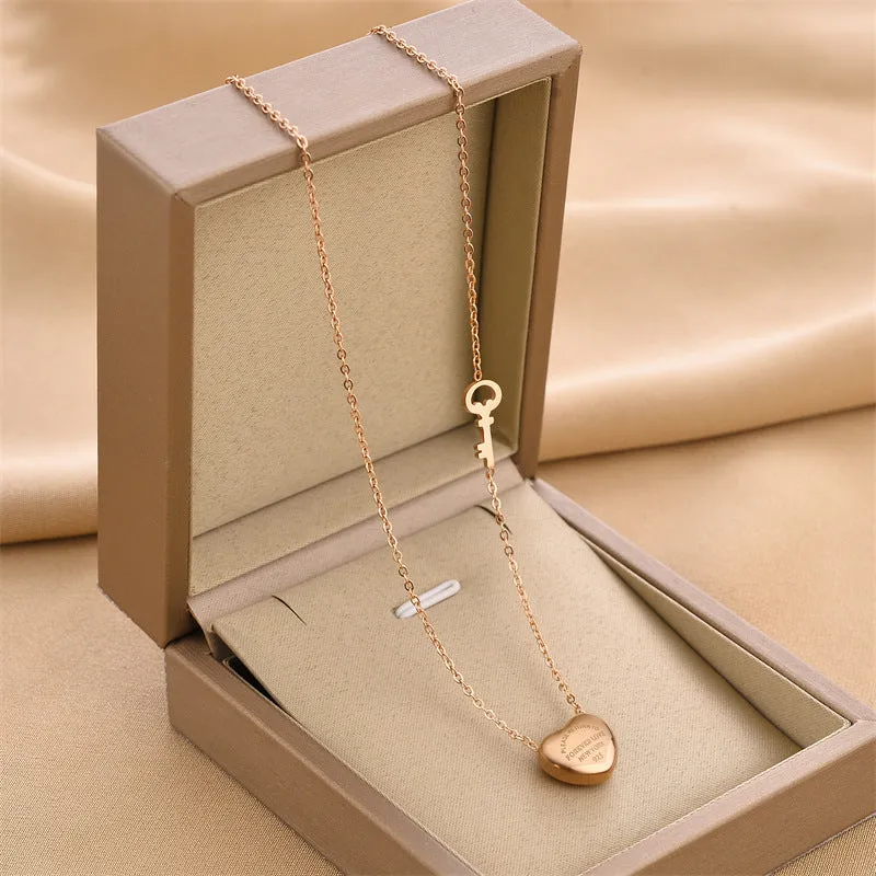 Titanium steel necklace with water wave chain and geometric mixed stone pendant in gold finish on woman