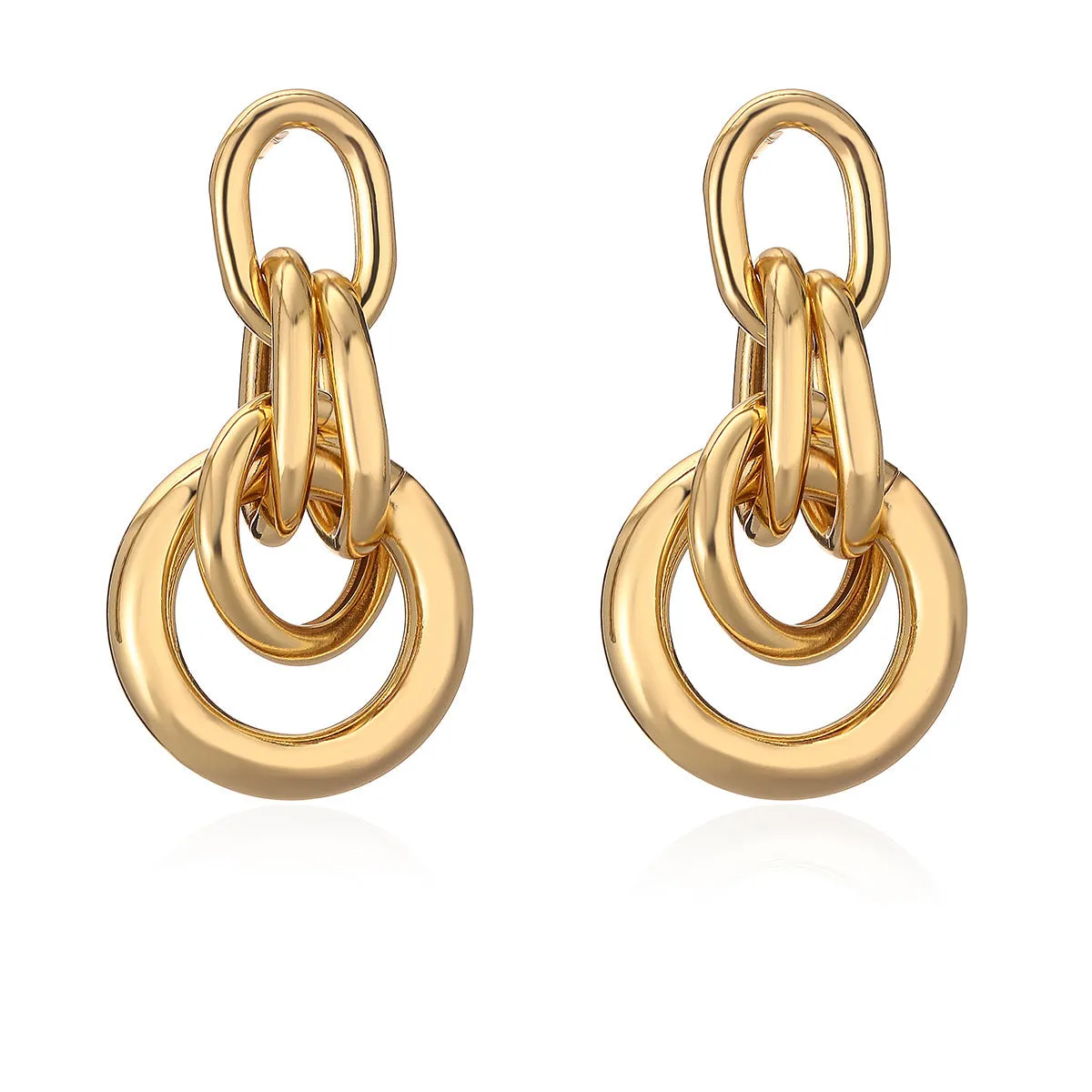 Gold geometric drop earrings with irregular design elements on copper base