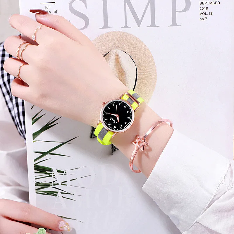 Ladies luminous starry sky watch with round 36mm dial and rainbow nylon canvas strap, pin buckle closure