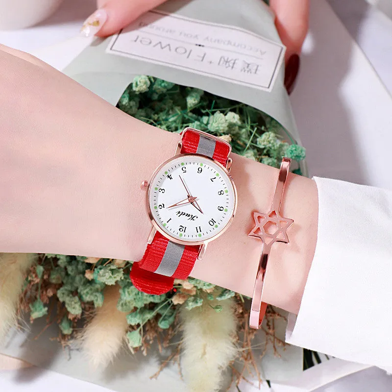 Ladies luminous starry sky watch with round 36mm dial and rainbow nylon canvas strap, pin buckle closure