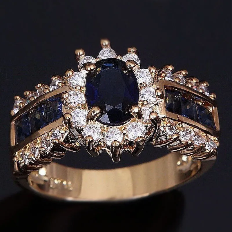 Personalised fashion rings with diamond treatments in blue and purple designs on zinc alloy