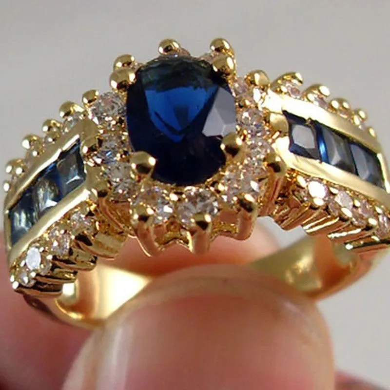 Personalised fashion rings with diamond treatments in blue and purple designs on zinc alloy
