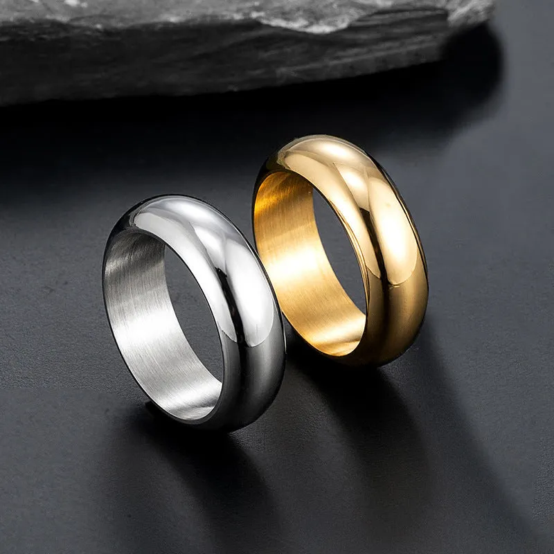 Glossy electroplated titanium steel ring shown in gold, black, and steel colour on a plain background.