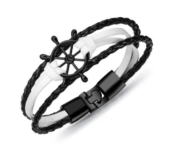 Alloy leather charm bracelet with black clasp fastening in brown colour option