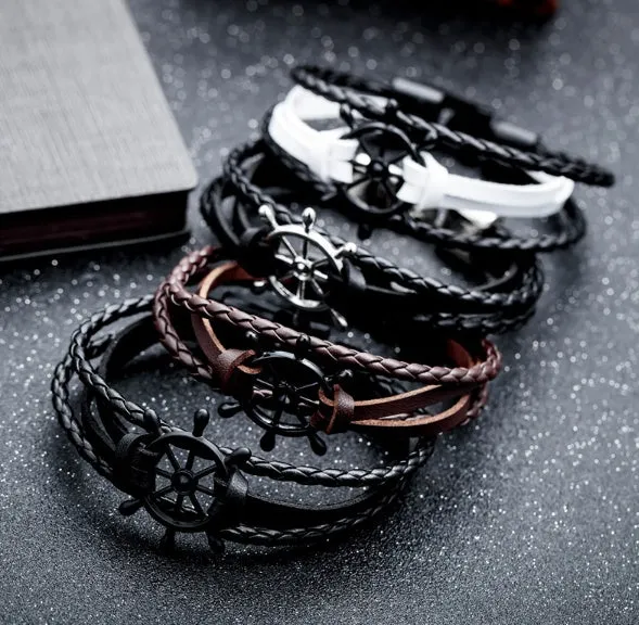 Alloy leather charm bracelet with black clasp fastening in brown colour option