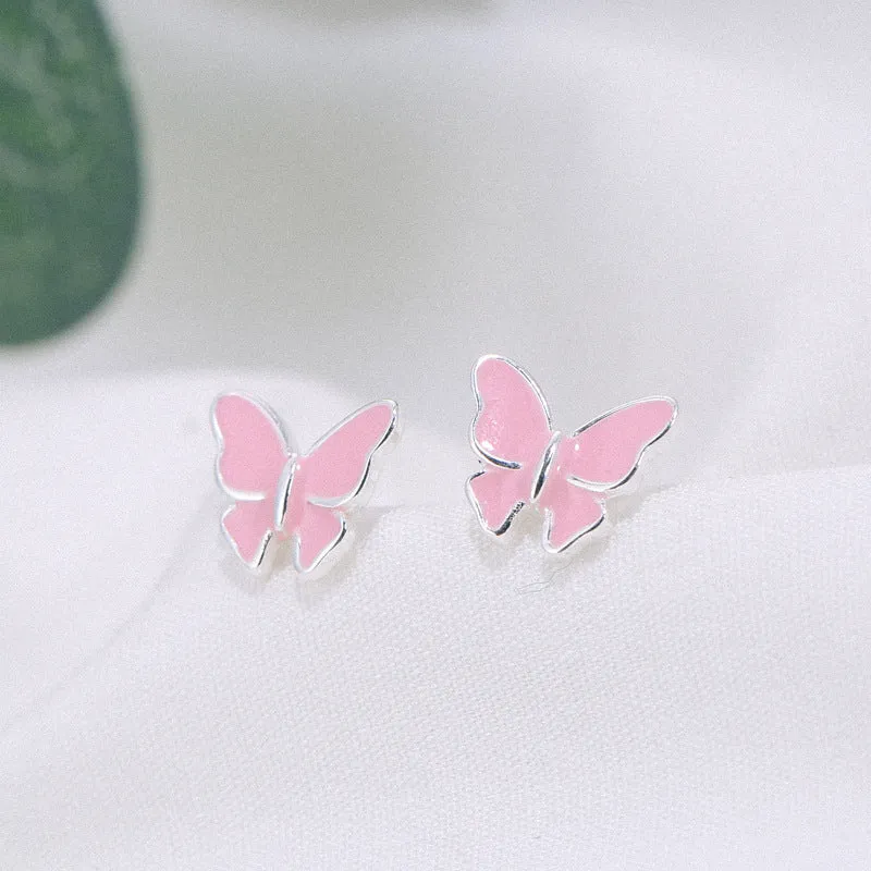 Side view of 925 silver butterfly stud earrings with geometric shape and plating finish