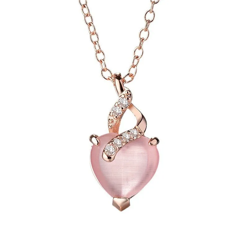 Women's heart-shaped pink artificial crystal pendant necklace on rose gold cross chain