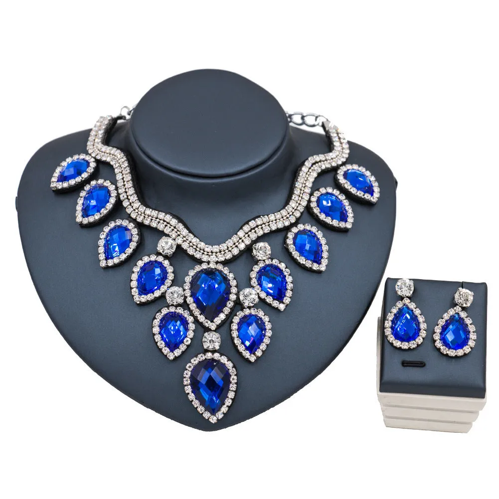 Colourful exaggerated bride necklace and earring set with gold accents for wedding