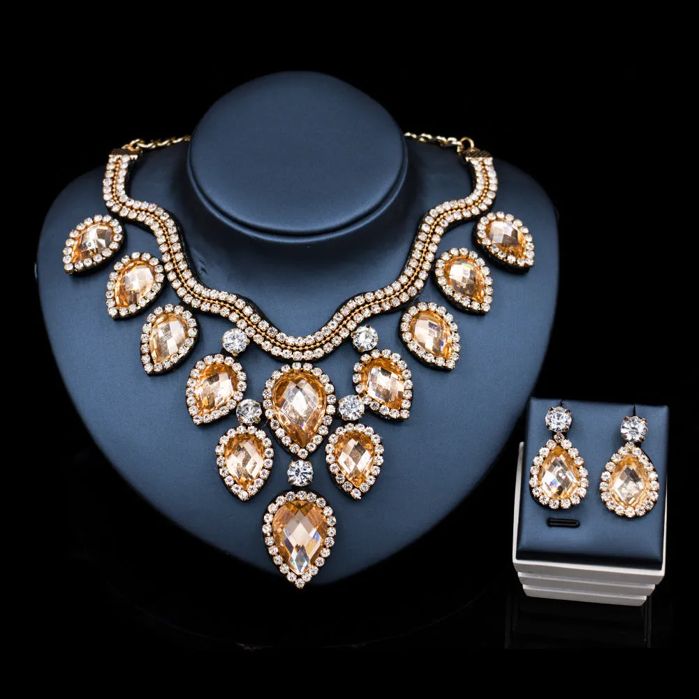 Colourful exaggerated bride necklace and earring set with gold accents for wedding
