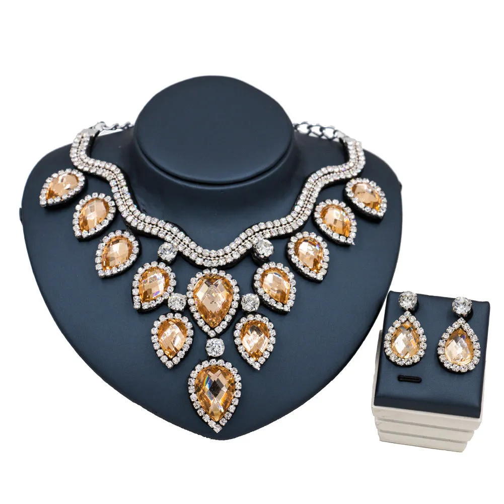 Colourful exaggerated bride necklace and earring set with gold accents for wedding