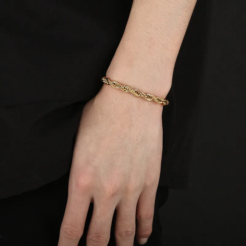 Gold double colour twist chain titanium steel bracelet with geometric design on white background