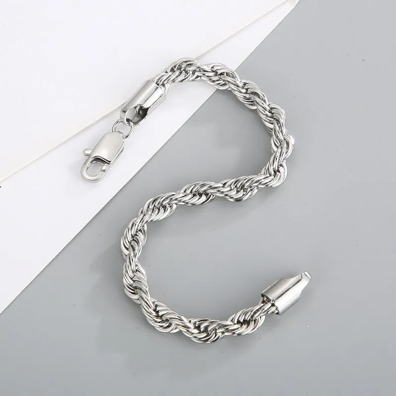 Gold double colour twist chain titanium steel bracelet with geometric design on white background