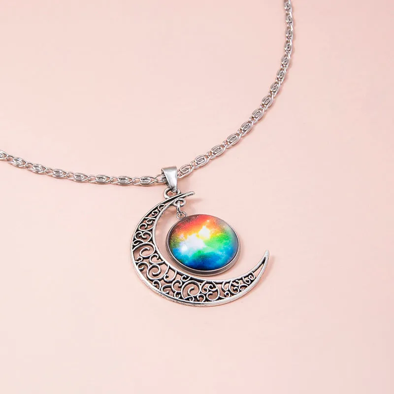 Silver hollow moon pendant necklace with glass star insert on Figaro chain for women