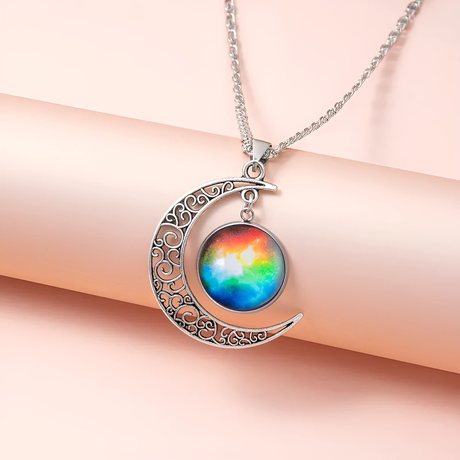Silver hollow moon pendant necklace with glass star insert on Figaro chain for women