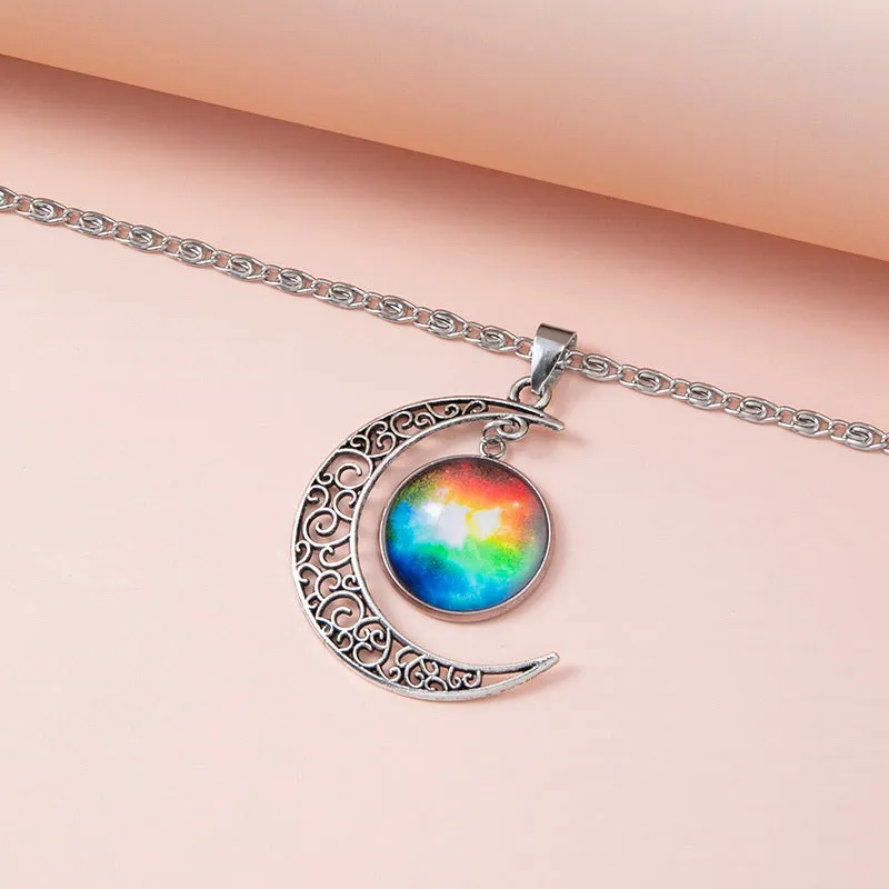 Silver hollow moon pendant necklace with glass star insert on Figaro chain for women