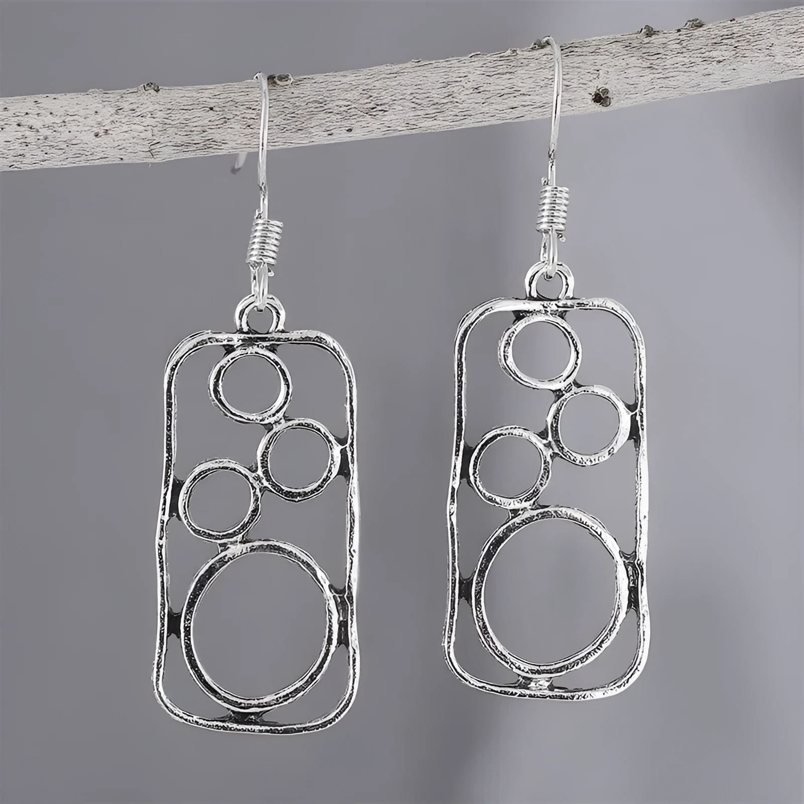 Geometric round earrings in antique silver finish made from zinc alloy for men and women