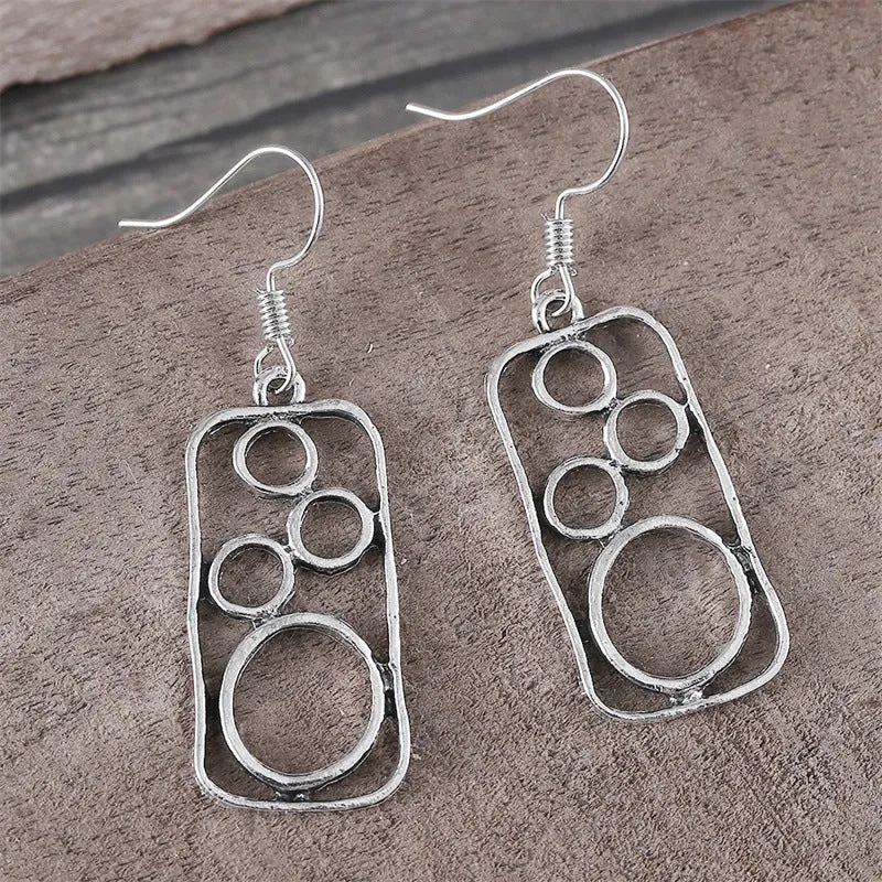 Geometric round earrings in antique silver finish made from zinc alloy for men and women