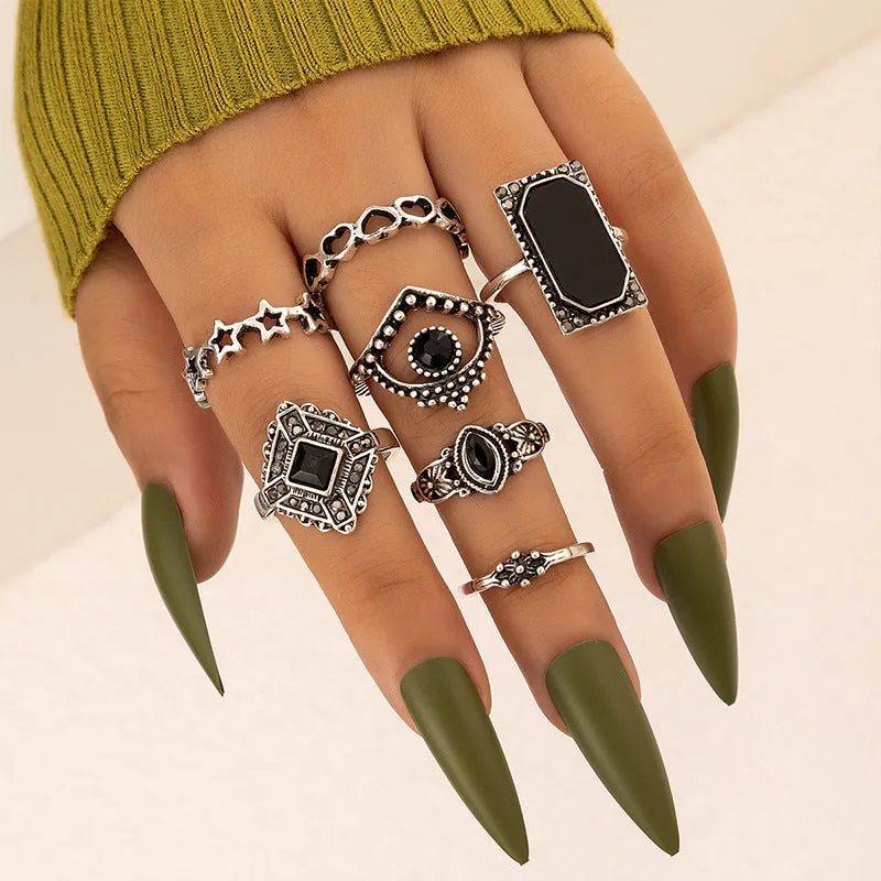 Alloy black gem U-shaped electroplated ring on display, silver colour option