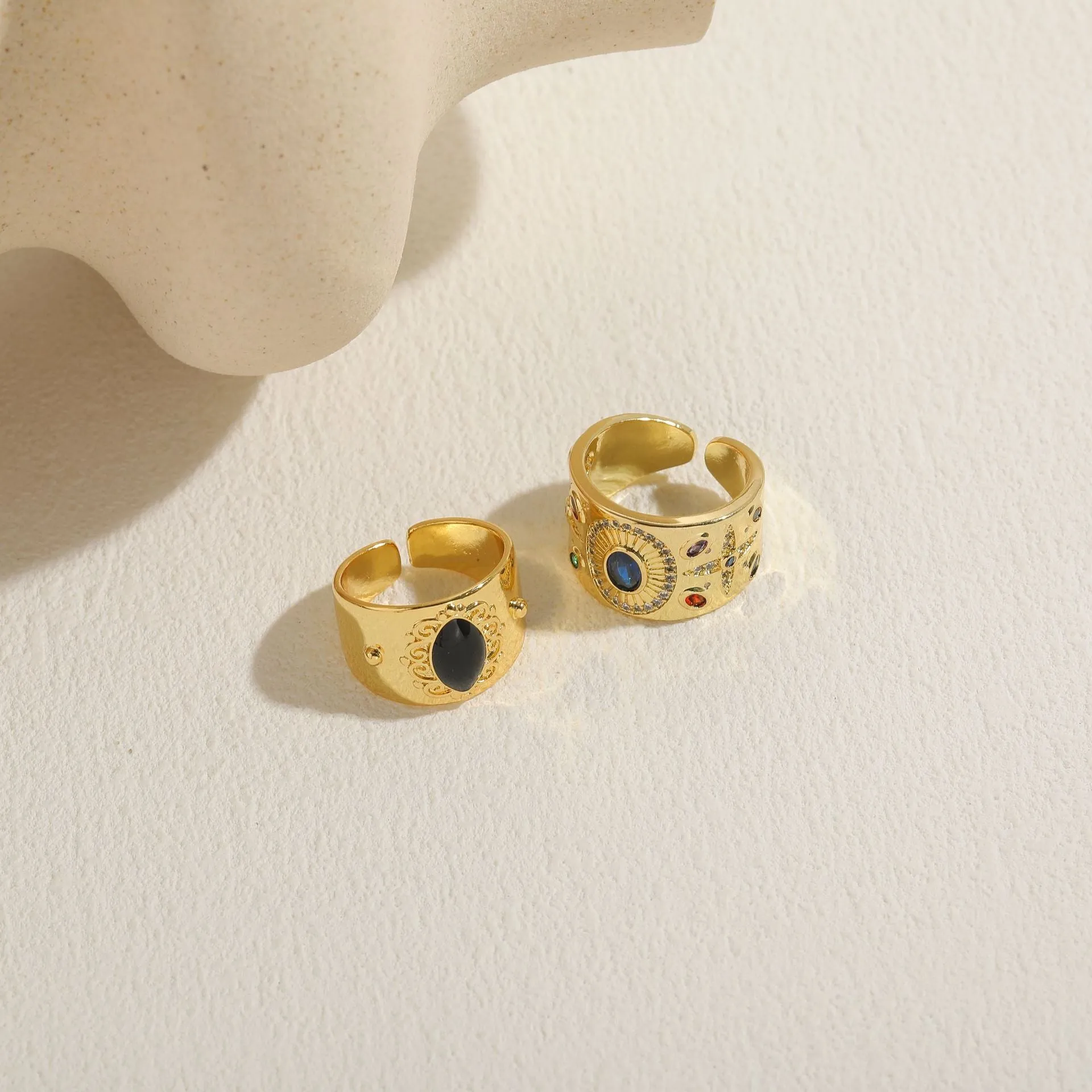 Geometric Chinese style vintage copper ring with electroplated horse eye black finish and zircon detailing