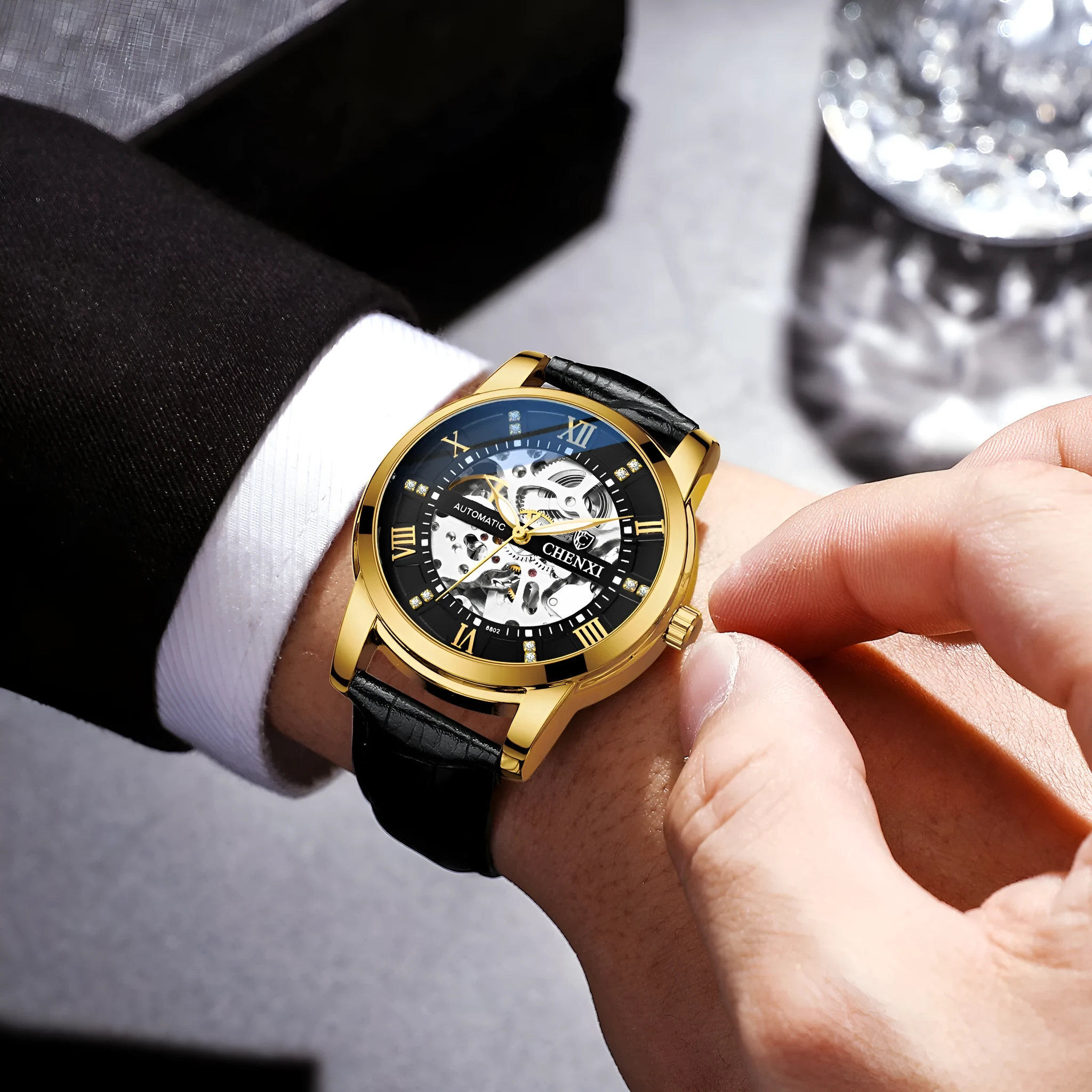 Hollow automatic mechanical watch for men with belt strap and metal shell, black surface, 13mm thickness