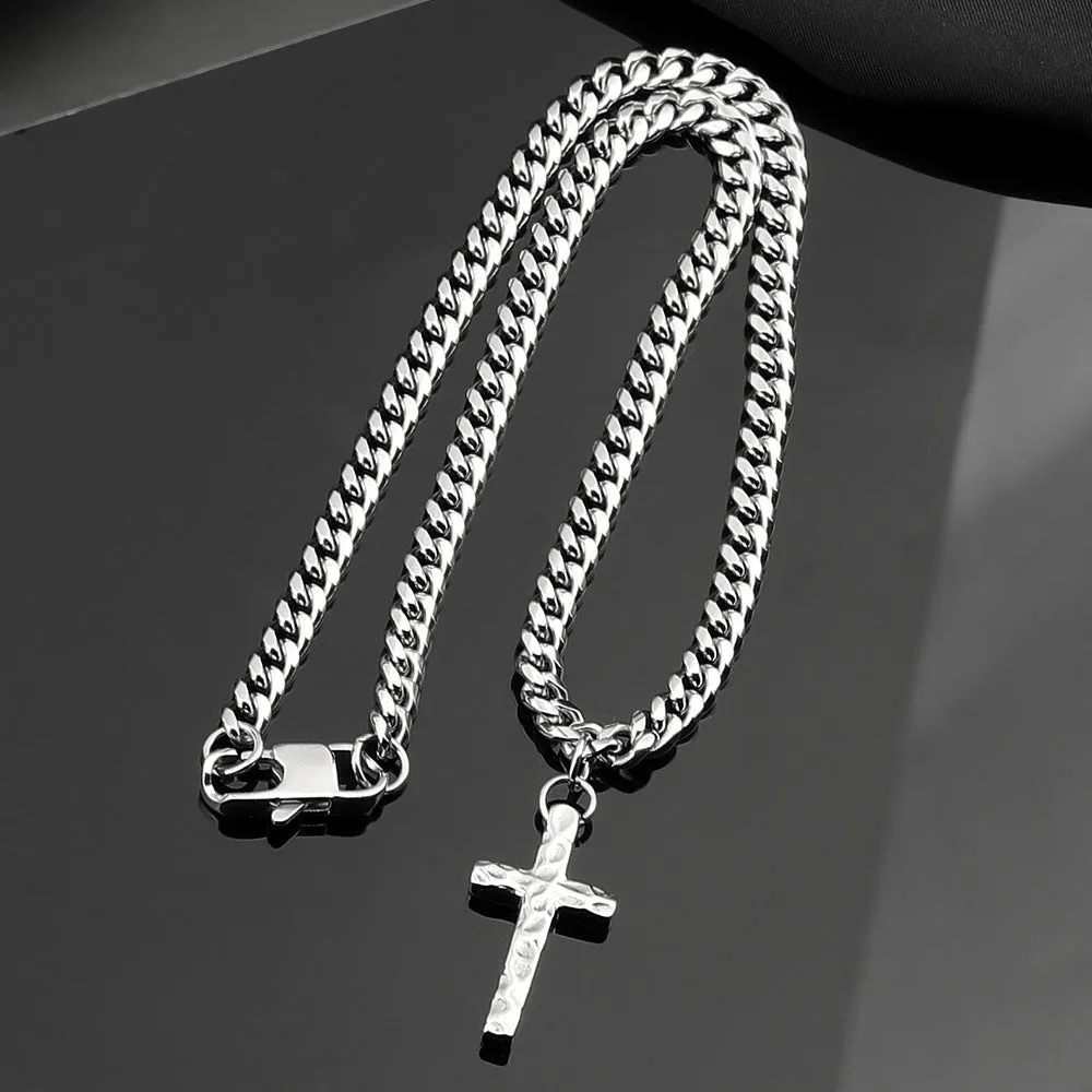 Titanium steel Cuban chain necklace in steel colour with geometric links on neutral background
