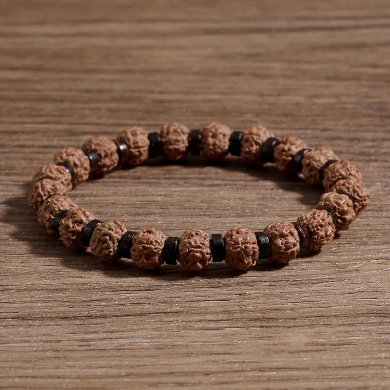 Brown volcanic stone agate beaded bracelet with rope chain on wrist