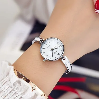 Steel belt fashion watch with gold or silver finish, 2.5cm dial, mineral glass, and steel strap on a white background