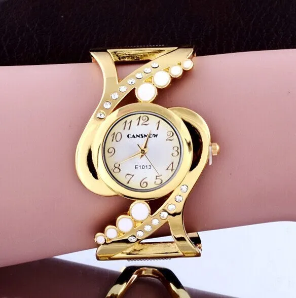 Ladies bracelet watch with white dial, stainless steel case, and alloy band on a neutral background